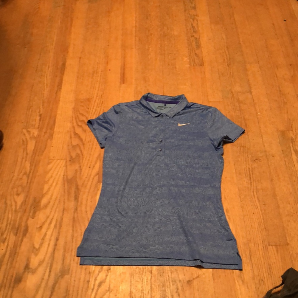 Women’s blue Nike golf shirt